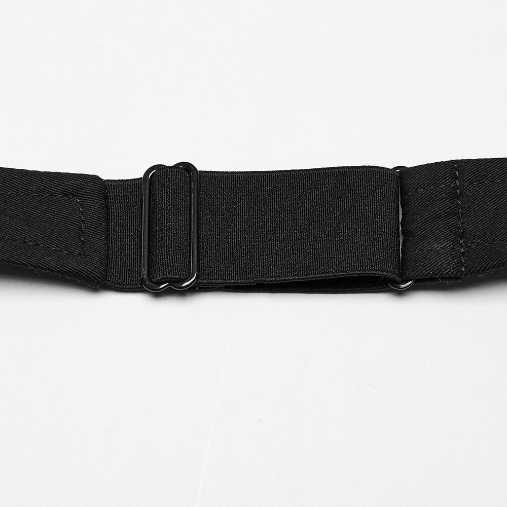 Close-up of a black strap showcasing a sturdy adjustable buckle, ideal for punk fashion and harness designs.