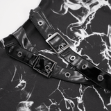 Close-up of the faux leather buckle details on a black and white gothic dress with smoky marble pattern.