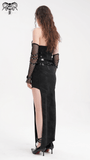 Back view of a striking black halter dress with chains, buckles, and a high slit, styled for alternative fashion.