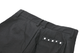 Edgy Pleated Shorts with Eyelet Accents and O-Ring Strap