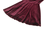 Burgundy velvet mini dress skirt with luxurious sheen and playful flared design, perfect for gothic elegance.