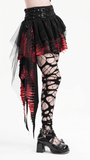 Asymmetrical black and red gothic skirt with tulle and lace, worn with fishnet leggings and chunky shoes.