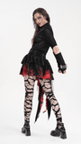 Model showcasing a tiered asymmetrical gothic skirt with tulle and lace in black and red, styled with edgy accessories.