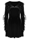 Elegant black velvet lace-up dress with flared sleeves and Gothic applique details. Perfect for a charming gothic look.